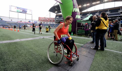 TREVOR HAGAN / WINNIPEG FREE PRESS
The 39th Manitoba Marathon, Sunday, June 18, 2017. Wheelchair half marathoner Jodi Tuckett lets her exhaustion show after completing her race.