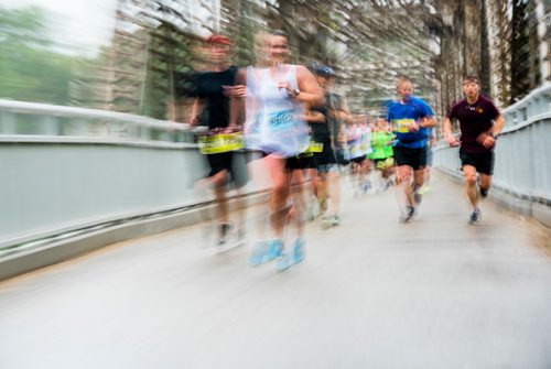 DAVID LIPNOWSKI / WINNIPEG FREE PRESS

Half Marathon participants run over the Elm Park Bridge Sunday June 18, 2017.