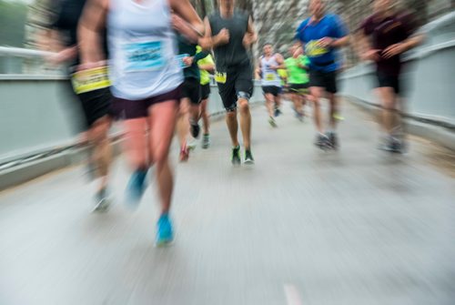 DAVID LIPNOWSKI / WINNIPEG FREE PRESS

Half Marathon participants run over the Elm Park Bridge Sunday June 18, 2017.