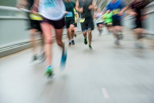 DAVID LIPNOWSKI / WINNIPEG FREE PRESS

Half Marathon participants run over the Elm Park Bridge Sunday June 18, 2017.