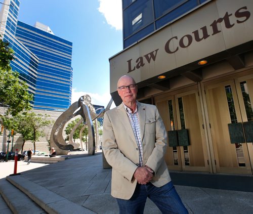 WAYNE GLOWACKI / WINNIPEG FREE PRESS

Judge Ray Wyant in front of the Law Courts bld. He's written a chapter for a new compilation book called "Tough Crimes" which includes 16 contributions from judges and lawyers across Canada. Mike McIntyre story  June 19   2017