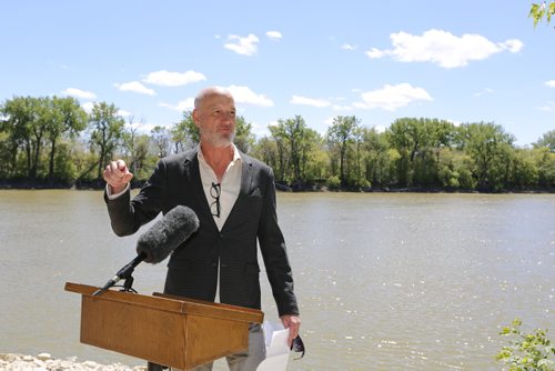 JUSTIN SAMANSKI-LANGILLE / WINNIPEG FREE PRESS
Paul Jordan, CEO of The Forks North Portage speaks at a press conference and ribbon cutting ceremony on the shore of the Red River Monday. The ceremony officially opened a new section of multi-use trials connecting Point Douglas to The Forks.
170619 - Monday, June 19, 2017.