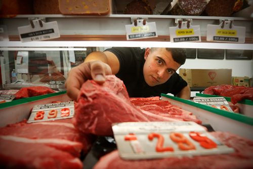 JOHN WOODS / WINNIPEG FREE PRESS
Photos of Billy Zeid, whose family owns Food Fair, at the meat counter at Portage Avenue location Monday, June 19, 2017. A recent report finds that meat prices are expected to go up an additional 7-9% this year.
