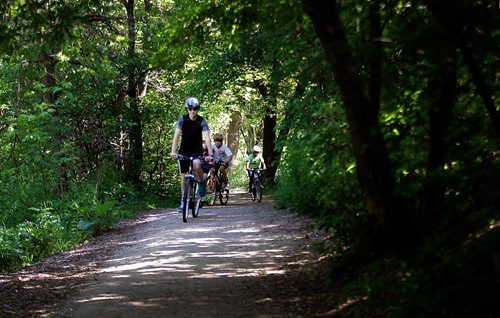 PHIL HOSSACK / WINNIPEG FREE PRESS  -   Cyclists make their way along Bunns Creek near Rothesay Monday. See Kelly Taylor story.  -  June 19, 2017