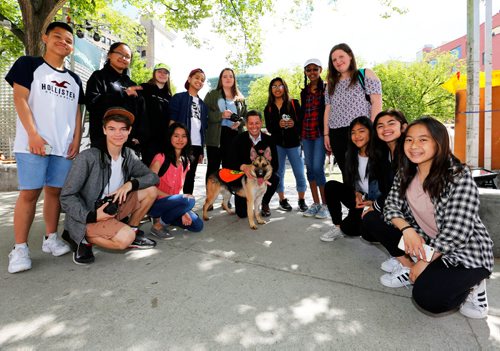 JUSTIN SAMANSKI-LANGILLE / WINNIPEG FREE PRESS
Mayor Brian Bowman and Dorothy, a German Shepard mix pose with students on a field trip Monday. Bowman will be walking dogs up for adoption by animal control to promote the rescue service.
170619 - Monday, June 19, 2017.