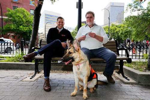 JUSTIN SAMANSKI-LANGILLE / WINNIPEG FREE PRESS
Mayor Brian Bowman, Free Press Columnist Doug Speirs and Dorothy, a German Shepard mix pause fro a break Monday while on a walk around town. Bowman will be walking dogs up for adoption by animal control to promote the rescue service.
170619 - Monday, June 19, 2017.