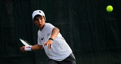 PHIL HOSSACK / WINNIPEG FREE PRESS  -   STANDUP/Agate - No quarter no mercy, 14 yr old Marcello Audino kept his eye on the ball and his mind on the match Tuesday night at the Manitoba Clay Court Championships. He too his match in two clean sets 6-0 and 6-0.   -  June 20, 2017