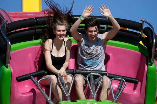 JOHN WOODS / WINNIPEG FREE PRESS
Brittany Unrau and Luke Stefansson ride the Crazy Mouse at the Ex Tuesday, June 20, 2017.