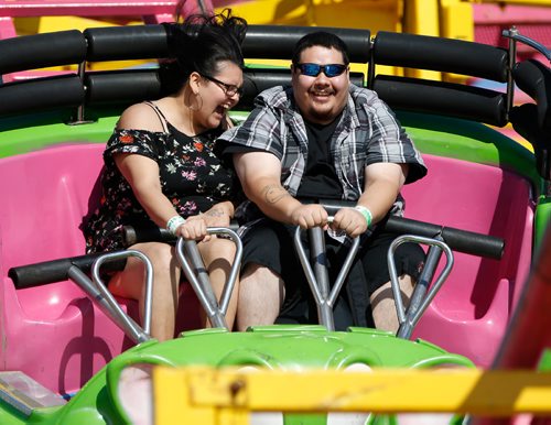 JOHN WOODS / WINNIPEG FREE PRESS
Kameo Price and Michael Ross ride the Crazy Mouse at the Ex Tuesday, June 20, 2017.