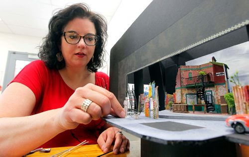 BORIS MINKEVICH / WINNIPEG FREE PRESS
Rainbow Stage stage project. Little Shop Of Horrors. In this photo set designer Lisa Hancharek poses for a photo with a scale model of her creation. May 30, 2017
