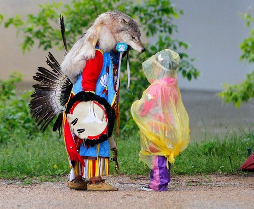 BORIS MINKEVICH / WINNIPEG FREE PRESS
APTN Aboriginal Day live at The Forks. From left Harley Bird,6, talks to his cousin Jordan Dare,3, as they wait out the rain that delayed the event's grand entry. They are both dancers. June 21, 2017
