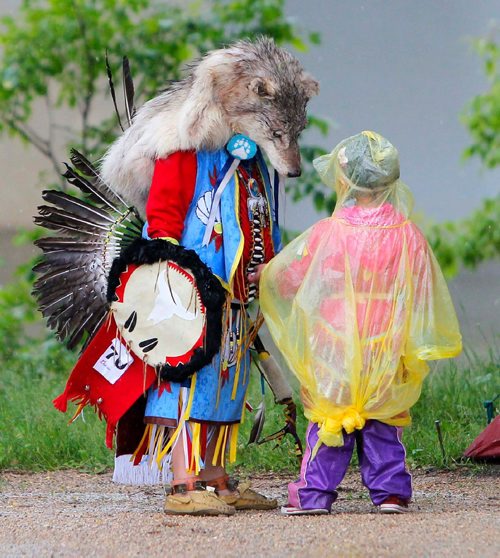 BORIS MINKEVICH / WINNIPEG FREE PRESS
APTN Aboriginal Day live at The Forks. From left Harley Bird,6, talks to his cousin Jordan Dare,3, as they wait out the rain that delayed the event's grand entry. They are both dancers. June 21, 2017
