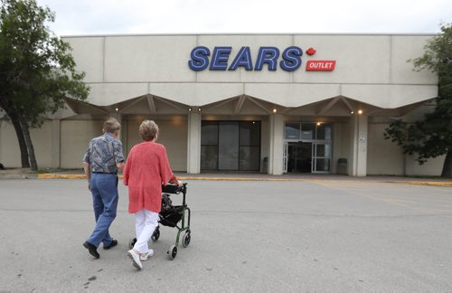 RUTH BONNEVILLE / WINNIPEG FREE PRESS

Former longtime Sears employees Edna and Norm Pohl 
have fond memories of working for the company and are sad to see it close.  The Pohls make their way into the Garden City Sears store Thursday afternoon.  
  For story on announcement that the company plans on closing stores across Canada including the Garden City outlet in Winnipeg.  

June 20, 2017
