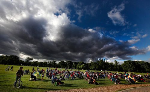 PHIL HOSSACK / WINNIPEG FREE PRESS  -  An appreciative audience oblivious to an ominous cloud as WSO Pops  performed at the Lyric in Assiniboine Park Thursday. See JennZoratti's story. June 22, 2017