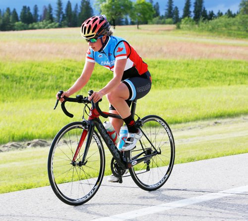 JUSTIN SAMANSKI-LANGILLE / WINNIPEG FREE PRESS
Triathlete Kyla Roy rides a section of the Canada Games cycling course during a training session on the East Beach at Birds Hill Provincial Park Thursday.
170622 - Thursday, June 22, 2017.
