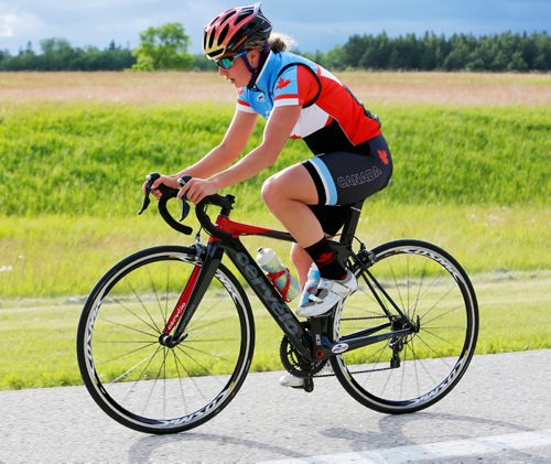 JUSTIN SAMANSKI-LANGILLE / WINNIPEG FREE PRESS
Triathlete Kyla Roy rides a section of the Canada Games cycling course during a training session on the East Beach at Birds Hill Provincial Park Thursday.
170622 - Thursday, June 22, 2017.
