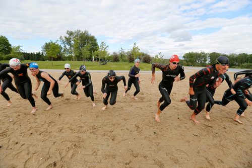 JUSTIN SAMANSKI-LANGILLE / WINNIPEG FREE PRESS
Young triathletes coached by Gary Pallett practice a race start for the swim portion of a triathlon on the East Beach of Birds Hill Provincial Park Thursday.
170622 - Thursday, June 22, 2017.