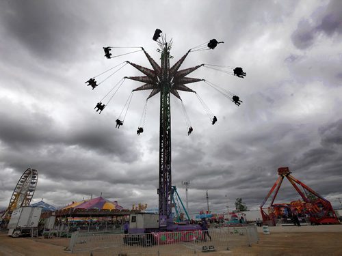 PHIL HOSSACK / WINNIPEG FREE PRESS  -   A cool cloudy afternoon kept many of the Red River Ex's rides running despite smaller crowds and a predicted high of only 15C Friday afternoon.  -  June 23, 2017
