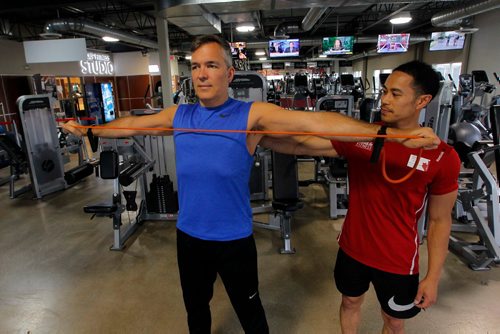 BORIS MINKEVICH / WINNIPEG FREE PRESS
From left, Robert Winslow with his trainer Steve Ramos at Goodlife Fitness on Kenaston Blvd. He started working with a personal trainer after his spouse signed him up for a gym membership. Joel Schlesinger story. June 23, 2017
