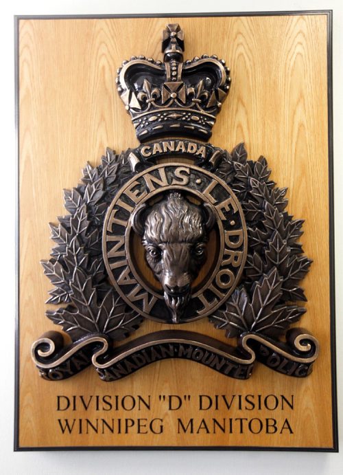 PHIL HOSSACK / WINNIPEG FREE PRESS  -    THE RCMP Chrest hangs outside D Division commander Scott Kolody's office Monday.-  June 26, 2017