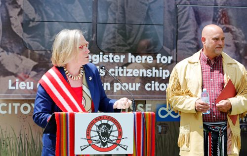 JUSTIN SAMANSKI-LANGILLE / WINNIPEG FREE PRESS
Carolyn Bennett, Minister of Indigenous and Northern Affairs speaks with Manitoba Metis Federation board member William Goodon in the background at the official unveiling of the Federation's new mobile outreach office Monday. The mobile office will travel to Metis communities providing much improved access to services such as citizenship applications and education programs.
170626 - Monday, June 26, 2017.