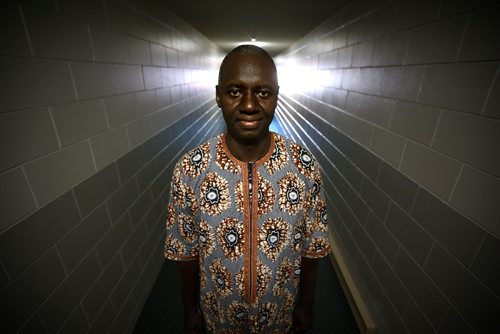 JOHN WOODS / WINNIPEG FREE PRESS
Abdoul Toure is photographed in his St Vital home in Winnipeg Tuesday, June 27, 2017. Abdoul is a French-speaking man from Mali with a masters degree in economics and is cleaning schools while he tries to improve his English so he can go back to university to get his degree recognized here. Hes upset that the feds are cutting funding for English classes beyond basic survival ESL.