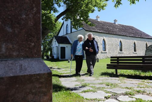 RUTH BONNEVILLE / WINNIPEG FREE PRESS

49.8 - Selkirk settlers / Peguis 
Former Selkirk Mayor, Peguis First Nation member Bill Shead walks with Olive Lillie, a long-time member of the Parish of St. Peter Old Stone Church, for a walkabout through 200 years of history on the grounds.  
See Alex Paul story.  
 

June 22, 2017