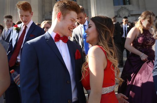 RUTH BONNEVILLE / WINNIPEG FREE PRESS

49.8 Feature: Class of  2017 Project: 
Griffin is dressed to the nines while having photos taken with his  girlfriend who he matches behind the Legislative Building before attending their graduation dinner later that evening.  
   
Final photos of The class of 2017 students (15),  on their graduation day from Glenlawn Collegiate.  Their convocation ceremony was held at The RBC Convention Centre on June 26th 2017 as well as their dinner and dance later that evening.  
See story on WFP's 13 year documentary on a group of students  who the Free Press followed and photographed from their 1st year in kindergarden in Windsor School to their graduating year in 2017 at Glenlawn Collegiate. 

See Doug Speirs story.  

June 26, 2017
