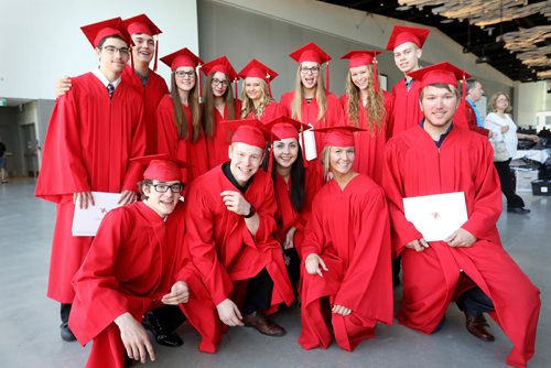 RUTH BONNEVILLE / WINNIPEG FREE PRESS

49.8 Feature: Class of  2017 Project:  
Group photo of 13 of the 15 "Class of 2017" students   (Noah, Griffin, Thomas,  Quinn, Sarah, Julianna, Naomi,  Mackenzie,  Hailey, Avery, Garrett, Sydney and  Aby),  gather together for a fun, informal group photo after their convocation ceremony.   (Jesse and Savanna not in photo)  

Final photos of The class of 2017 students (15),  on their graduation day from Glenlawn Collegiate.  Their convocation ceremony was held at The RBC Convention Centre on June 26th 2017 as well as their dinner and dance later that evening.  
See story on WFP's 13 year documentary on a group of students  who the Free Press followed and photographed from their 1st year in kindergarden in Windsor School to their graduating year in 2017 at Glenlawn Collegiate. 

See Doug Speirs story.  

June 26, 2017