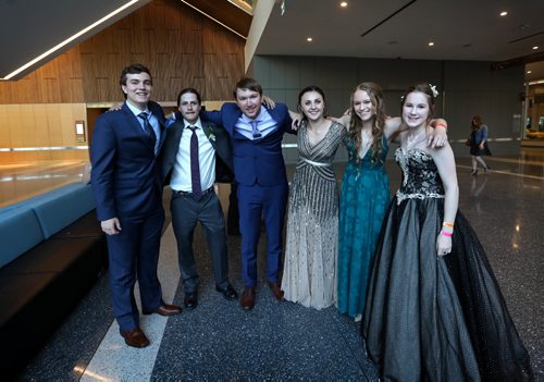 RUTH BONNEVILLE / WINNIPEG FREE PRESS

49.8 Feature: Class of  2017 Project:    
Group photo duplicating a kindergarden group photo with some of the remaining students at their graduation dinner.  Names from left: Quinn, Devon (was a part of project in beginning but changed schools), Garrett, Aby, Hailey and Sarah.   

Final photos of The class of 2017 students (15),  on their graduation day from Glenlawn Collegiate.  Their convocation ceremony was held at The RBC Convention Centre on June 26th 2017 as well as their dinner and dance later that evening.  
See story on WFP's 13 year documentary on a group of students  who the Free Press followed and photographed from their 1st year in kindergarden in Windsor School to their graduating year in 2017 at Glenlawn Collegiate. 

See Doug Speirs story.  

June 26, 2017