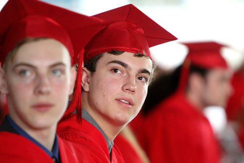 RUTH BONNEVILLE / WINNIPEG FREE PRESS

49.8 Feature: Class of  2017 Project:    
Quinn with his red cap and gown on at convocation ceremony.  

Final photos of The class of 2017 students (15),  on their graduation day from Glenlawn Collegiate.  Their convocation ceremony was held at The RBC Convention Centre on June 26th 2017 as well as their dinner and dance later that evening.  
See story on WFP's 13 year documentary on a group of students  who the Free Press followed and photographed from their 1st year in kindergarden in Windsor School to their graduating year in 2017 at Glenlawn Collegiate. 

See Doug Speirs story.  

June 26, 2017
