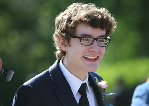 RUTH BONNEVILLE / WINNIPEG FREE PRESS

49.8 Feature: Class of  2017 Project:    
Noah is all smiles wearing his suit and tie as he hangs out with  friends at the fountain behind the Legislative Building before attending their graduation dinner later that evening.  

Final photos of The class of 2017 students (15),  on their graduation day from Glenlawn Collegiate.  Their convocation ceremony was held at The RBC Convention Centre on June 26th 2017 as well as their dinner and dance later that evening.  
See story on WFP's 13 year documentary on a group of students  who the Free Press followed and photographed from their 1st year in kindergarden in Windsor School to their graduating year in 2017 at Glenlawn Collegiate. 

See Doug Speirs story.  

June 26, 2017