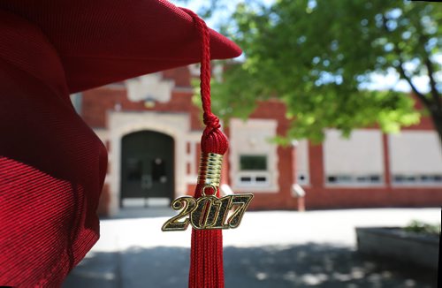 RUTH BONNEVILLE / WINNIPEG FREE PRESS

49.8 Feature: Class of  2017 Project:    
Photo of just 2017 tassel and cap with Windsor School in behind it.  

Final photos of The class of 2017 students (15),  on their graduation day from Glenlawn Collegiate.  Their convocation ceremony was held at The RBC Convention Centre on June 26th 2017 as well as their dinner and dance later that evening.  
See story on WFP's 13 year documentary on a group of students  who the Free Press followed and photographed from their 1st year in kindergarden in Windsor School to their graduating year in 2017 at Glenlawn Collegiate. 

See Doug Speirs story.  

June 26, 2017