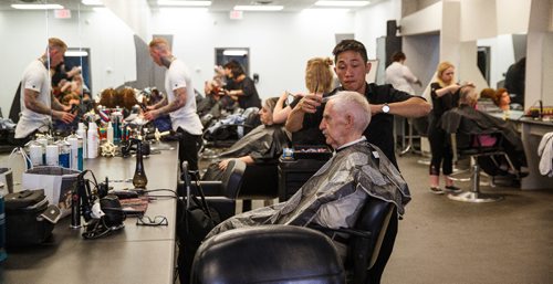 MIKE DEAL / WINNIPEG FREE PRESS
Students cut the hair of clients who pay a nominal fee for a cut.
Scientific Marvel Beauty School, which has operated in the city for more than 100 years, will be closing at the end of October. The owners are retiring and have no one to take over the business, so they will be selling the building and closing the school.
170629 - Thursday, June 29, 2017.