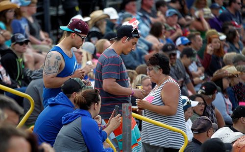 PHIL HOSSACK / WINNIPEG FREE PRESS  -   Fans didn't forget the other reason to party Friday night at Dauphin's Country Festival as Canada's 150th approiached.   -  June 30 2017