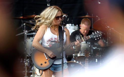 PHIL HOSSACK / WINNIPEG FREE PRESS  -   Meghan Patrick got the crowd warmed up when she took the stage first Friday evening Friday at Dauphin's Country Festival.   -  June 30 2017