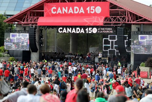 TREVOR HAGAN / WINNIPEG FREE PRESS
Crowds watching Attica Riots during Canada Day and Canada 150 celebrations at The Forks, Saturday, July 1, 2017.