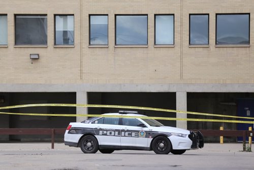 TREVOR HAGAN / WINNIPEG FREE PRESS 
Police at the scene in a parking lot south of St.Mary between Smith and Garry where 3 people were stabbed around midnight Saturday, Sunday, July 2, 2017.