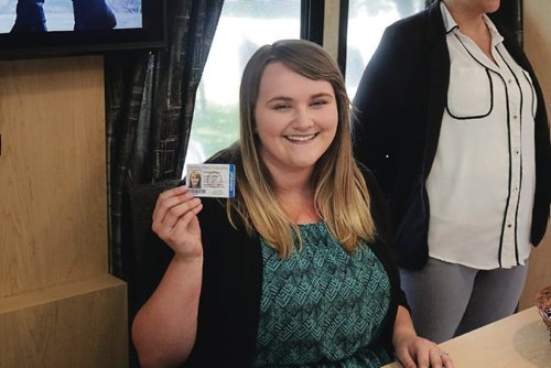 Canstar Community News June 26, 2017 - Kassidy Johnson, Manitoba Metis Federation navigator with the central registry office, demonstrates how people can get their status card at the MMFs mobile outreach office. (LIGIA BRAIDOTTI/CANSTAR COMMUNITY NEWS/TIMES)