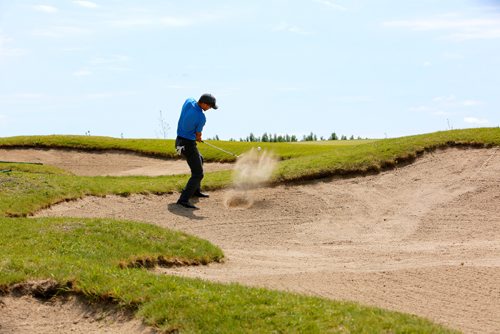 JUSTIN SAMANSKI-LANGILLE / WINNIPEG FREE PRESS
Drew Jones form Brandon, MB hits the ball out of a sand trap Monday at Southwood Golf and Country Club during qualification for the Players Cup.
170703 - Monday, July 03, 2017.