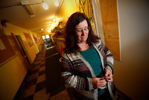 JOHN WOODS / WINNIPEG FREE PRESS
Cathy Somerset, acting executive director, St Therese Child Care Facility gets upset as she is photographed in the smoke damaged hallway of the facility Monday, July 3, 2017. The child care facility was damaged by a fire.

