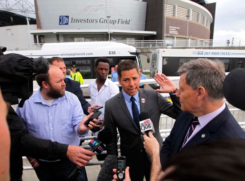BORIS MINKEVICH / WINNIPEG FREE PRESS
Stadium Station at Investors Group Field. Opening of Stadium Station, the first piece of the Southwest Transitway Stage 2. FROM MIDDLE LEFT, Winnipeg Mayor Brian Bowman and Member of Parliament for Winnipeg South Terry Duguid. CAROL SANDERS STORY. July 4, 2017

