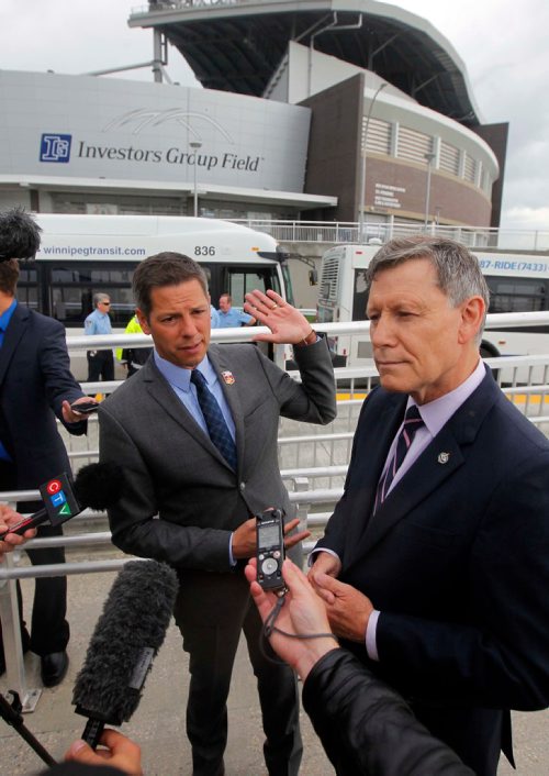 BORIS MINKEVICH / WINNIPEG FREE PRESS
Stadium Station at Investors Group Field. Opening of Stadium Station, the first piece of the Southwest Transitway Stage 2. From left, Winnipeg Mayor Brian Bowman and Member of Parliament for Winnipeg South Terry Duguid. CAROL SANDERS STORY. July 4, 2017
