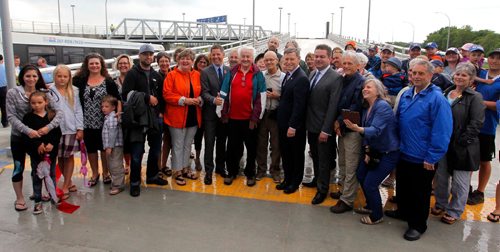 BORIS MINKEVICH / WINNIPEG FREE PRESS
Stadium Station at Investors Group Field. Opening of Stadium Station, the first piece of the Southwest Transitway Stage 2. A group photos of officials and some descendants of the original Bohemier family that used to have a link to the land where things are built. CAROL SANDERS STORY. July 4, 2017
