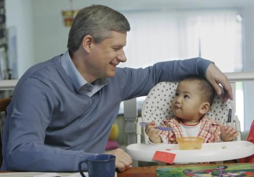 Prime Minister Stephen Harper has breakfast with 14 month old Eric Huang during a campaign stop in Richmond, BC, September 9, 2008. Canandians go to the polls in a Federal election October 14. Lyle Stafford For the Winnipeg Free Press