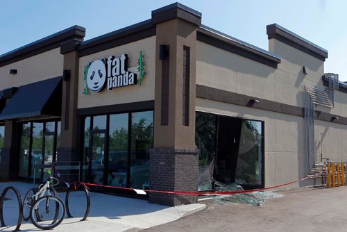 BORIS MINKEVICH / WINNIPEG FREE PRESS
Early this morning the Fat Panda shop on St. Annes was robbed when a black SUV rammed through their front windows. July 5, 2017
