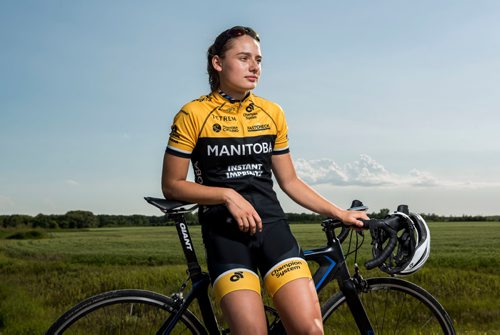 DAVID LIPNOWSKI / WINNIPEG FREE PRESS

Chloe Penner is a local cyclist competing in the Canada Games this summer in Winnipeg. She poses for a photo prior to the Grand Pointe Road Race in Grand Pointe, Manitoba Wednesday July 5, 2017.