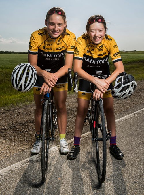 DAVID LIPNOWSKI / WINNIPEG FREE PRESS

Chloe Penner (left) and Rebecca Man (right) are both local cyclists competing in the Canada Games this summer in Winnipeg. They pose for a photo prior to the Grand Pointe Road Race in Grand Pointe, Manitoba Wednesday July 5, 2017.