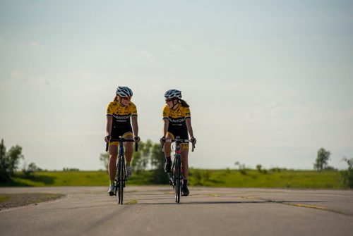 DAVID LIPNOWSKI / WINNIPEG FREE PRESS

Chloe Penner (left) and Rebecca Man (right) are both local cyclists competing in the Canada Games this summer in Winnipeg. They pose for a photo prior to the Grand Pointe Road Race in Grand Pointe, Manitoba Wednesday July 5, 2017.