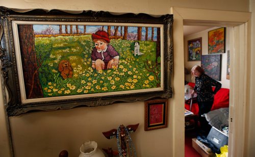 WAYNE GLOWACKI / WINNIPEG FREE PRESS

Undiscovered artist and would-be published author Grazyna (Grace) Brown surrounded by her art work in her home in the North End. At left is an oil painting she did of her nephew. Gord Sinclair  story  July 6  2017